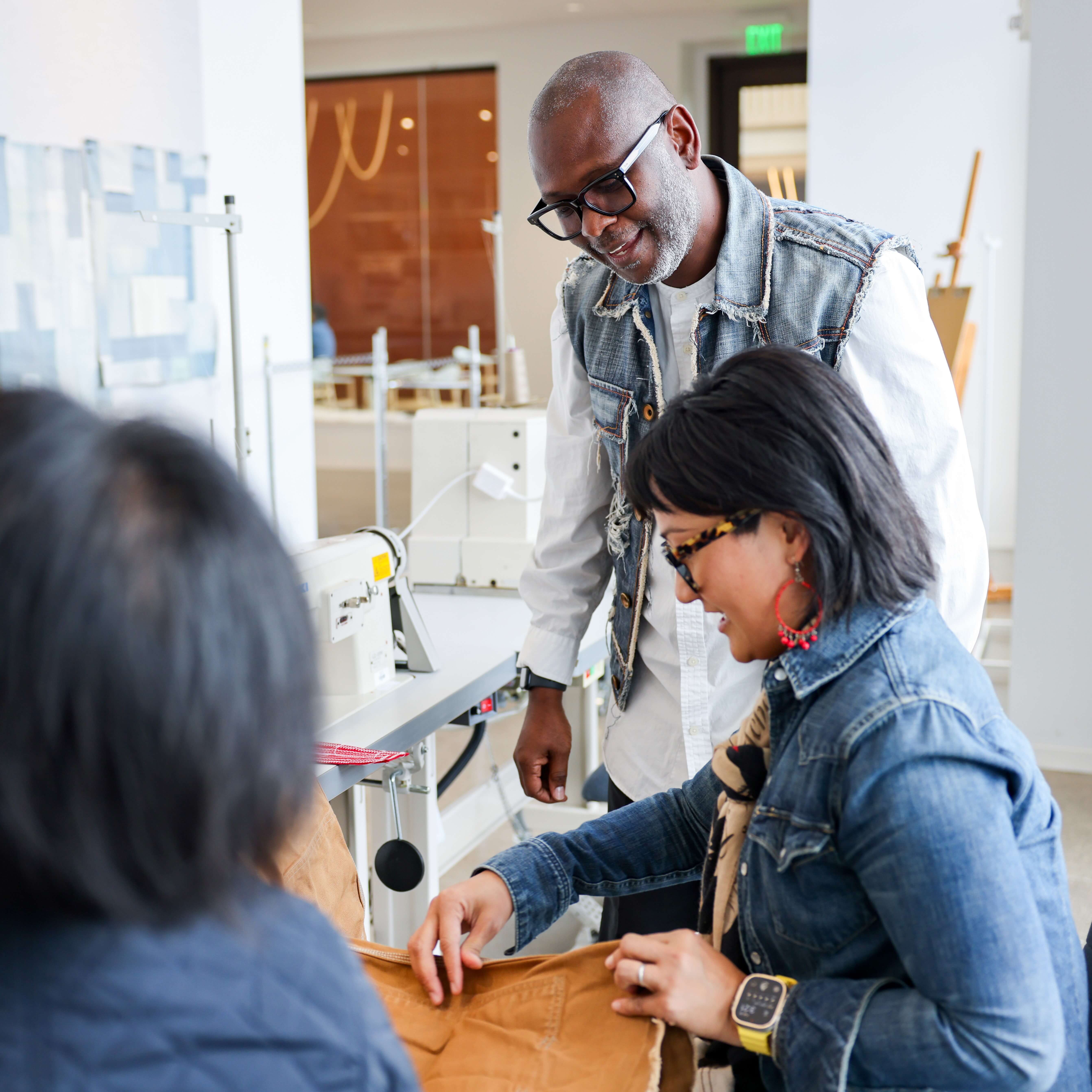 a woman and man looking at clothes